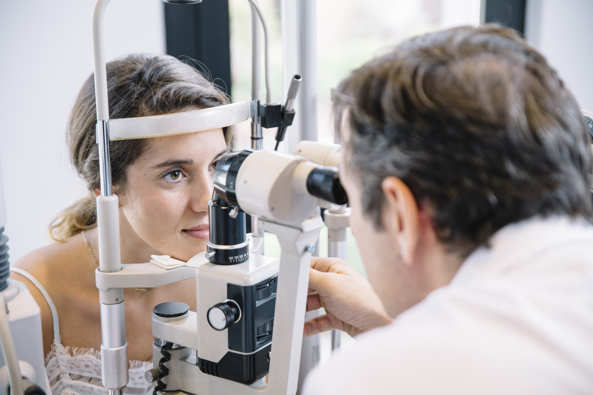 Doctors checking a patient’s eyes