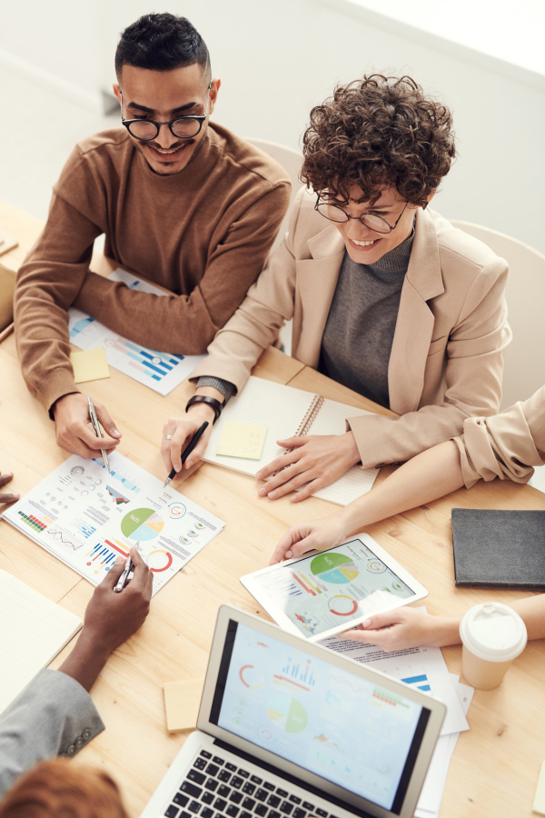 Group of people working and discussing products